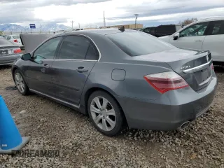 2009 Acura RL Tech Pkg with VIN JH4KB26609C002111, listed as a Copart auction lot 84668184 with 149,870 mi miles and Salvage Title. Bid and sale history available at carsss.com. Image 2.
