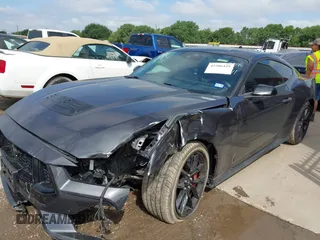 2024 Ford Mustang GT with VIN 1FA6P8CF0R5411098, listed as a IAAI auction lot 42206429 with 22,743 mi miles and . Bid and sale history available at DreamBid. Image 2.