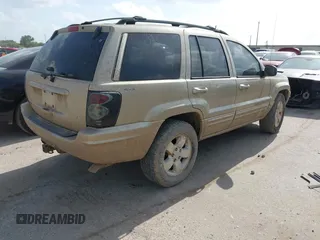 2001 Jeep Grand Cherokee Limited with VIN 1J4GW58N51C575036, listed as a IAAI auction lot 42573849 with 223,757 mi miles and . Bid and sale history available at DreamBid. Image 4.