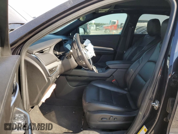 2022 Cadillac XT4 FWD Premium Luxury z VIN 1GYFZCR44NF151123, wystawiony jako Copart lot #50312745 z przebiegiem 46 820 mil mil oraz Szkoda całkowita • Salvage title. Historia ofert i sprzedaży dostępna na DreamBid. Obrazek 7.