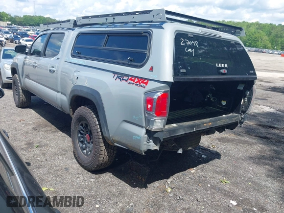 2021 Toyota Tacoma SR5 with VIN 3TMDZ5BN3MM112338, listed as a IAAI auction lot 42241704 with 81,346 mi miles and . Bid and sale history available at DreamBid. Image 3.