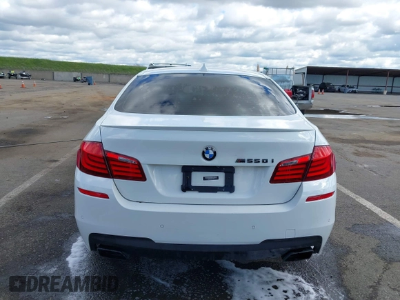 2013 BMW 5 Series 550i with VIN WBAFR9C55DDX79824, listed as a IAAI auction lot 41703036 with 107,166 mi miles and . Bid and sale history available at carsss.com. Image 16.