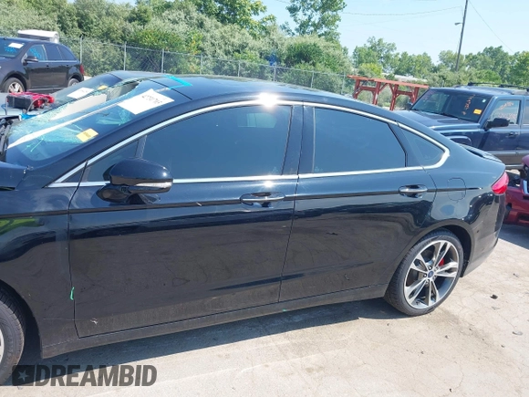 2017 Ford Fusion Titanium with VIN 3FA6P0K9XHR117300, listed as a IAAI auction lot 42731703 with 47,276 mi miles and . Bid and sale history available at DreamBid. Image 14.