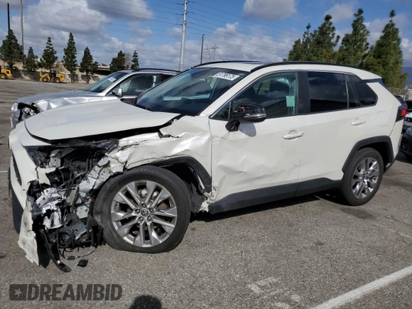 2021 Toyota RAV4 XLE Premium with VIN 2T3C1RFV1MW180625, listed as a Copart auction lot 51799175 with 63,692 mi miles and Salvage title. Bid and sale history available at DreamBid. Image 1.
