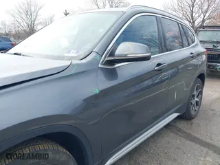 2019 BMW X1 xDrive28i with VIN WBXHT3C51K5L90571, listed as a IAAI auction lot 41909209 with 35,902 mi miles. Bid and sale history available at carsss.com. Image 20.