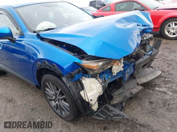 2017 Mazda CX-3 Touring z VIN JM1DKFC7XH0171860, wystawiony jako IAAI lot #42249818 z przebiegiem 54 873 mil mil oraz . Historia ofert i sprzedaży dostępna na DreamBid. Obrazek 18.