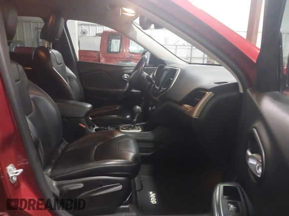2015 Jeep Cherokee Limited with VIN 1C4PJLDS0FW585595, listed as a IAAI auction lot 41371621 with 102,108 mi miles and . Bid and sale history available at DreamBid. Image 5.