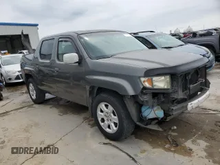 2007 Honda Ridgeline RTL z VIN 2HJYK16577H511325, wystawiony jako Copart lot #57619725 z przebiegiem 161 037 mil mil oraz Szkoda całkowita • Salvage title. Historia ofert i sprzedaży dostępna na DreamBid. Obrazek 4.