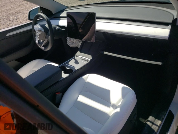 2023 Tesla Model Y Long Range with VIN 7SAYGDEE6PF861451, listed as a Copart auction lot 53133854 with 7,216 mi miles and Salvage Title. Bid and sale history available at DreamBid. Image 8.