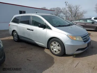 2011 Honda Odyssey LX with VIN 5FNRL5H25BB036725, listed as a IAAI auction lot 41512917 with 138,450 mi miles. Bid and sale history available at carsss.com. Image 1.