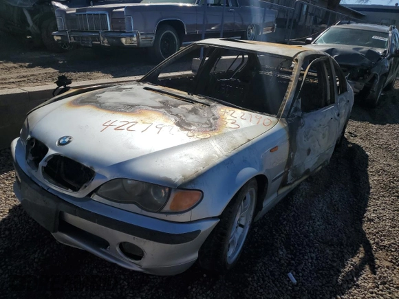2002 BMW 3 Series 330i with VIN WBAEV53472KM22788, listed as a Copart auction lot 42279083 with 0 mi miles and Salvage Title. Bid and sale history available at carsss.com. Image 1.