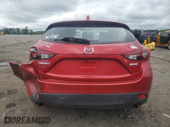 2014 Mazda 3 i Grand Touring z VIN JM1BM1M7XE1101669, wystawiony jako Copart lot #56504335 z przebiegiem 94 832 mil mil oraz Szkoda całkowita • Salvage title. Historia ofert i sprzedaży dostępna na DreamBid. Obrazek 6.