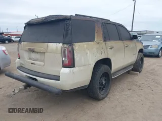 2015 GMC Yukon SLT with VIN 1GKS1BKC0FR114047, listed as a IAAI auction lot 41272792 with 1 mi miles. Bid and sale history available at carsss.com. Image 4.