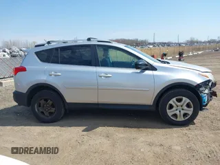 2014 Toyota RAV4 LE with VIN 2T3BFREV4EW136537, listed as a IAAI auction lot 42065728 with 211,039 mi miles and . Bid and sale history available at DreamBid. Image 14.