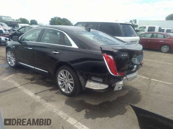 2019 Cadillac XTS Luxury with VIN 2G61M5S30K9131129, listed as a IAAI auction lot 33247508 with 89,208 mi miles and . Bid and sale history available at DreamBid. Image 3.