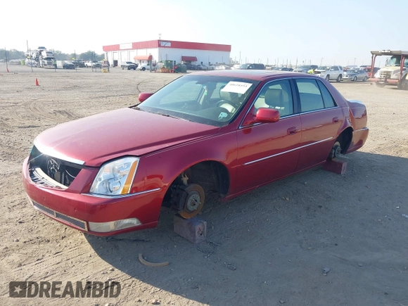 2008 Cadillac DTS 1SC with VIN 1G6KD57Y08U143396, listed as a IAAI auction lot 40618555 with 124,706 mi miles and . Bid and sale history available at carsss.com. Image 2.
