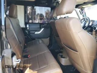 2012 Jeep Wrangler Unlimited Rubicon with VIN 1C4HJWFG9CL276753, listed as a Copart auction lot 62996995 with 234,159 mi miles and Clean title. Bid and sale history available at DreamBid. Image 11.