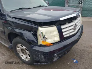 2005 Cadillac Escalade z VIN 1GYEK63N95R124940, wystawiony jako IAAI lot #42255300 z przebiegiem 160 355 mil mil oraz . Historia ofert i sprzedaży dostępna na DreamBid. Obrazek 17.