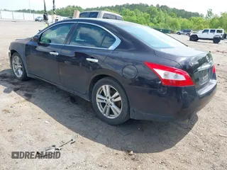 2011 Nissan Maxima SV with VIN 1N4AA5AP5BC841586, listed as a IAAI auction lot 42162383 with 412,977 mi miles and . Bid and sale history available at DreamBid. Image 3.
