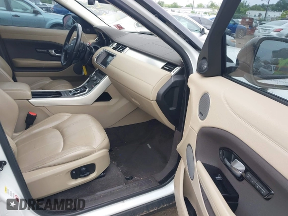 2016 Land Rover Range Rover Evoque SE z VIN SALVP2BG2GH085063, wystawiony jako IAAI lot #42337615 z przebiegiem 99 391 mil mil oraz . Historia ofert i sprzedaży dostępna na DreamBid. Obrazek 5.