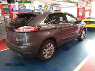2021 Ford Edge Titanium with VIN 2FMPK4K95MBA50355, listed as a IAAI auction lot 42821253 with 109,191 mi miles and . Bid and sale history available at DreamBid. Image 40.