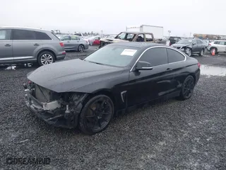 2015 BMW 4 Series 428i xDrive with VIN WBA3N5C56FK197981, listed as a IAAI auction lot 41145927 with 101,944 mi miles. Bid and sale history available at carsss.com. Image 18.