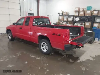 2005 Dodge Dakota ST with VIN 1D7HW22K75S103803, listed as a IAAI auction lot 41547470 with 220,238 mi miles. Bid and sale history available at carsss.com. Image 3.