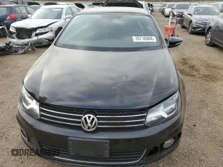 2015 Volkswagen Eos Komfort with VIN WVWBW8AH4FV001321, listed as a Copart auction lot 78718404 with 73,296 mi miles and Salvage Title. Bid and sale history available at DreamBid. Image 5.