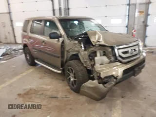 2011 Honda Pilot LX with VIN 5FNYF4H22BB023704, listed as a IAAI auction lot 41892628 with 113,704 mi miles. Bid and sale history available at carsss.com. Image 1.