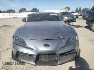 2022 Toyota GR Supra 3.0 with VIN WZ1DB0C01NW048328, listed as a Copart auction lot 75040374 with 0 mi miles and Salvage Title. Bid and sale history available at carsss.com. Image 5.