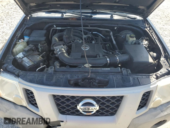 2013 Nissan Xterra S z VIN 5N1AN0NUXDN820818, wystawiony jako Copart lot #52364075 z przebiegiem 120 987 mil mil oraz Szkoda całkowita • Salvage title. Historia ofert i sprzedaży dostępna na DreamBid. Obrazek 11.