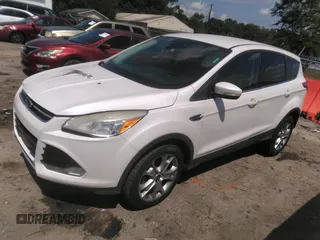 2013 Ford Escape SEL with VIN 1FMCU0HX1DUB63673, listed as a IAAI auction lot 42232003 with 116,230 mi miles and . Bid and sale history available at DreamBid. Image 2.