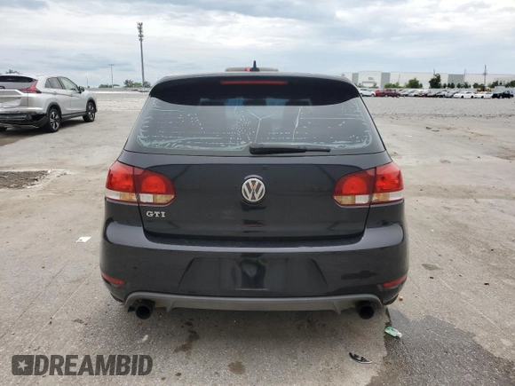 2012 Volkswagen Golf GTI Autobahn z VIN WVWHV7AJ6CW002616, wystawiony jako Copart lot #59335815 z przebiegiem 137 497 mil mil oraz Szkoda całkowita • Salvage title. Historia ofert i sprzedaży dostępna na DreamBid. Obrazek 6.