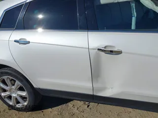 2013 Cadillac SRX Performance Collection with VIN 3GYFNHE31DS597987, listed as a IAAI auction lot 42319058 with 139,670 mi miles and . Bid and sale history available at DreamBid. Image 6.