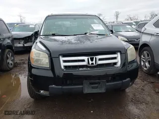 2007 Honda Pilot EX-L with VIN 5FNYF28557B028997, listed as a IAAI auction lot 41742267 with 217,114 mi miles. Bid and sale history available at carsss.com. Image 6.