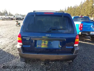 2004 Ford Escape XLT with VIN 1FMYU03134KA30806, listed as a IAAI auction lot 41449933 with 137,897 mi miles. Bid and sale history available at carsss.com. Image 16.