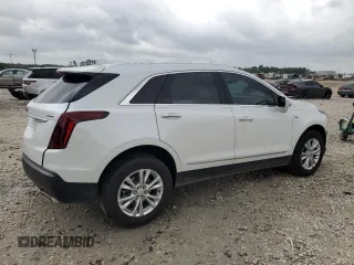 2024 Cadillac XT5 FWD Luxury with VIN 1GYKNAR4XRZ747310, listed as a Copart auction lot 55598585 with 14,371 mi miles and Salvage title. Bid and sale history available at DreamBid. Image 3.