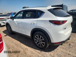 2018 Mazda CX-5 Grand Touring z VIN JM3KFBDM1J0473754, wystawiony jako Copart lot #60362245 z przebiegiem 72 792 mil mil oraz Szkoda całkowita • Salvage title. Historia ofert i sprzedaży dostępna na DreamBid. Obrazek 2.