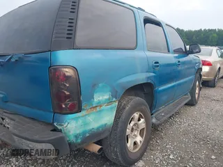 2001 GMC Yukon SLT z VIN 1GKEK13TX1J191325, wystawiony jako IAAI lot #42306665 z przebiegiem Nie podano mil oraz . Historia ofert i sprzedaży dostępna na DreamBid. Obrazek 13.