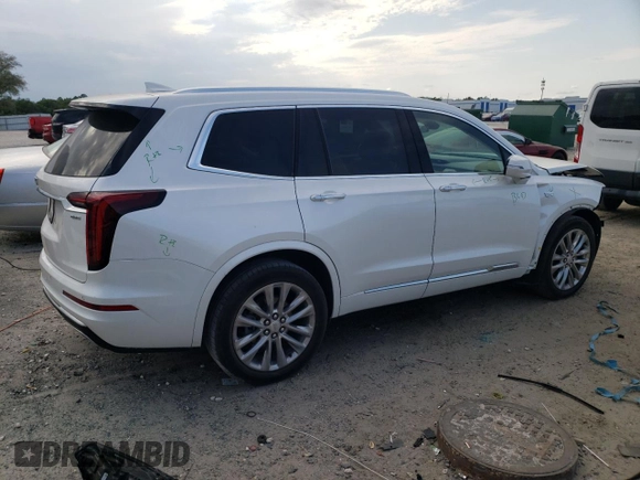 2023 Cadillac XT6 FWD Premium Luxury with VIN 1GYKPCRS5PZ120161, listed as a Copart auction lot 54614235 with 39,700 mi miles and Salvage title. Bid and sale history available at DreamBid. Image 3.