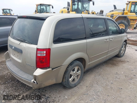 2009 Dodge Grand Caravan SE z VIN 1D8HN44E99B509833, wystawiony jako IAAI lot #42277393 z przebiegiem Nie podano mil oraz . Historia ofert i sprzedaży dostępna na DreamBid. Obrazek 4.