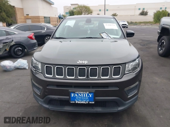 2018 Jeep Compass Sport with VIN 3C4NJCAB6JT502651, listed as a IAAI auction lot 42100724 with 84,238 mi miles and . Bid and sale history available at DreamBid. Image 12.