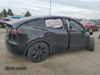 2025 Tesla Model Y Long Range z VIN 7SAYGAEE4SF260398, wystawiony jako Copart lot #54580745 z przebiegiem Nie podano mil oraz Szkoda całkowita • Salvage title. Historia ofert i sprzedaży dostępna na DreamBid. Obrazek 3.