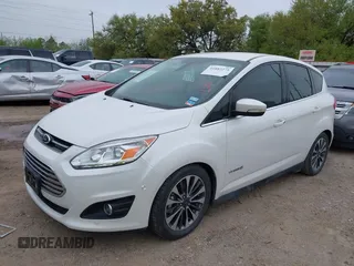 2018 Ford C-Max Titanium with VIN 1FADP5DUXJL104279, listed as a IAAI auction lot 41882275 with 55,137 mi miles and . Bid and sale history available at DreamBid. Image 17.
