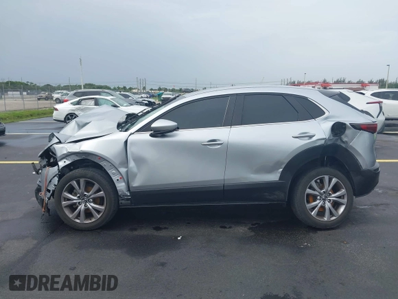 2021 Mazda CX-30 Select with VIN 3MVDMBBLXMM246600, listed as a IAAI auction lot 42418629 with 77,713 mi miles and . Bid and sale history available at DreamBid. Image 13.