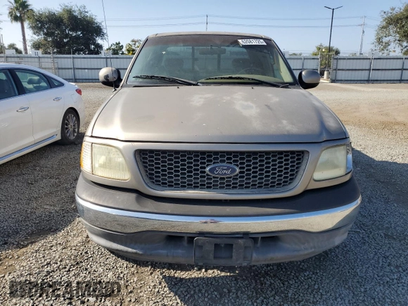 2002 Ford F-150 XL z VIN 1FTRX17232KC51909, wystawiony jako Copart lot #62081725 z przebiegiem Nie podano mil oraz Czysty tytuł • Clean title. Historia ofert i sprzedaży dostępna na DreamBid. Obrazek 5.
