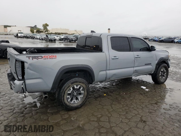 2021 Toyota Tacoma 4WD SR5 with VIN 3TMDZ5BN5MM098717, listed as a Copart auction lot 43877975 with 21,328 mi miles and Salvage Title. Bid and sale history available at carsss.com. Image 3.