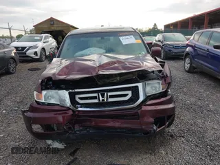 2010 Honda Ridgeline RTL with VIN 5FPYK1F57AB005602, listed as a IAAI auction lot 42208633 with 106,777 mi miles and . Bid and sale history available at DreamBid. Image 12.