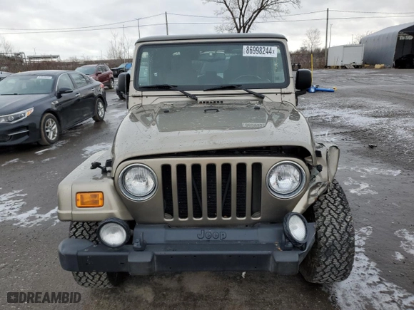 2004 Jeep Wrangler Sahara with VIN 1J4FA59S04P782428, listed as a Copart auction lot 86998244 with 59,447 mi miles and Salvage Title. Bid and sale history available at carsss.com. Image 5.