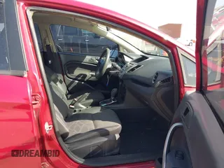 2012 Ford Fiesta SE z VIN 3FADP4EJ9CM140948, wystawiony jako IAAI lot #42301818 z przebiegiem 109 276 mil mil oraz . Historia ofert i sprzedaży dostępna na DreamBid. Obrazek 5.